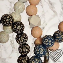 Load image into Gallery viewer, Wooden Beads Wristlet - Faux Leather Tassel